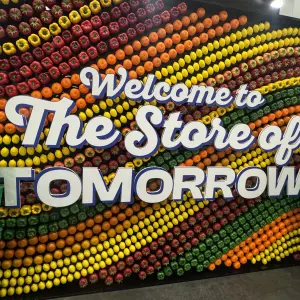 Attendees walked through a mock store that featured lots of new technology.