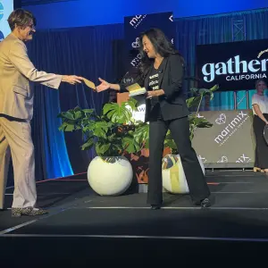 Mari receiving a golden ticket