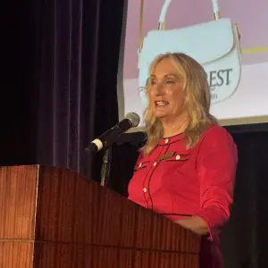 Rhonda Tagge updating the news from Olive Crest