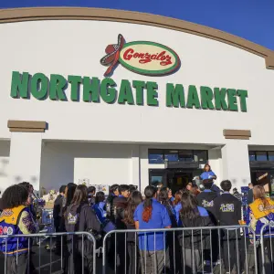 Front of store with marching band.jpg