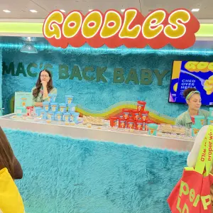 Goodles got creative with bright colors and furry walls in their booth.