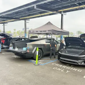 Tesla showing off the sound system in Teslas and their ability to sinc flashing headlights to the music