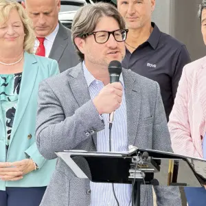 Michael Tou, with Cottie Petrie-Norris' Office