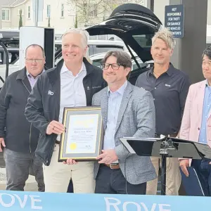 Michael Tou with Cottie Petrie-Norris' Office