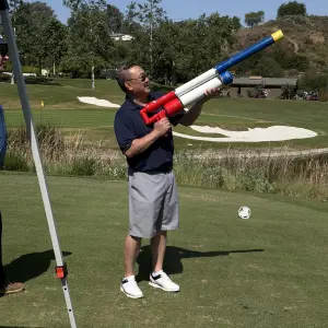 Parker Nishi, firing the gun 320 yards to the green.