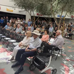 Gathering inside the Olive Crest Courtyard.