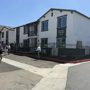 The Curtis and Jill Scheetz apartmet homes to the left. Kenny and Vera Thompson apartment home to the right