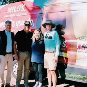 AGA President Ellie Taylor and friends at the Milo's Tea van